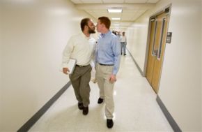 men kiss at city hall